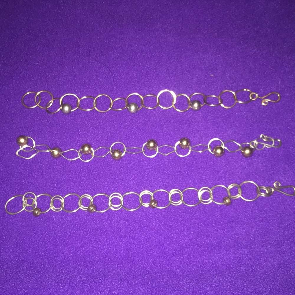 Women’s sterling silver and gold bracelets